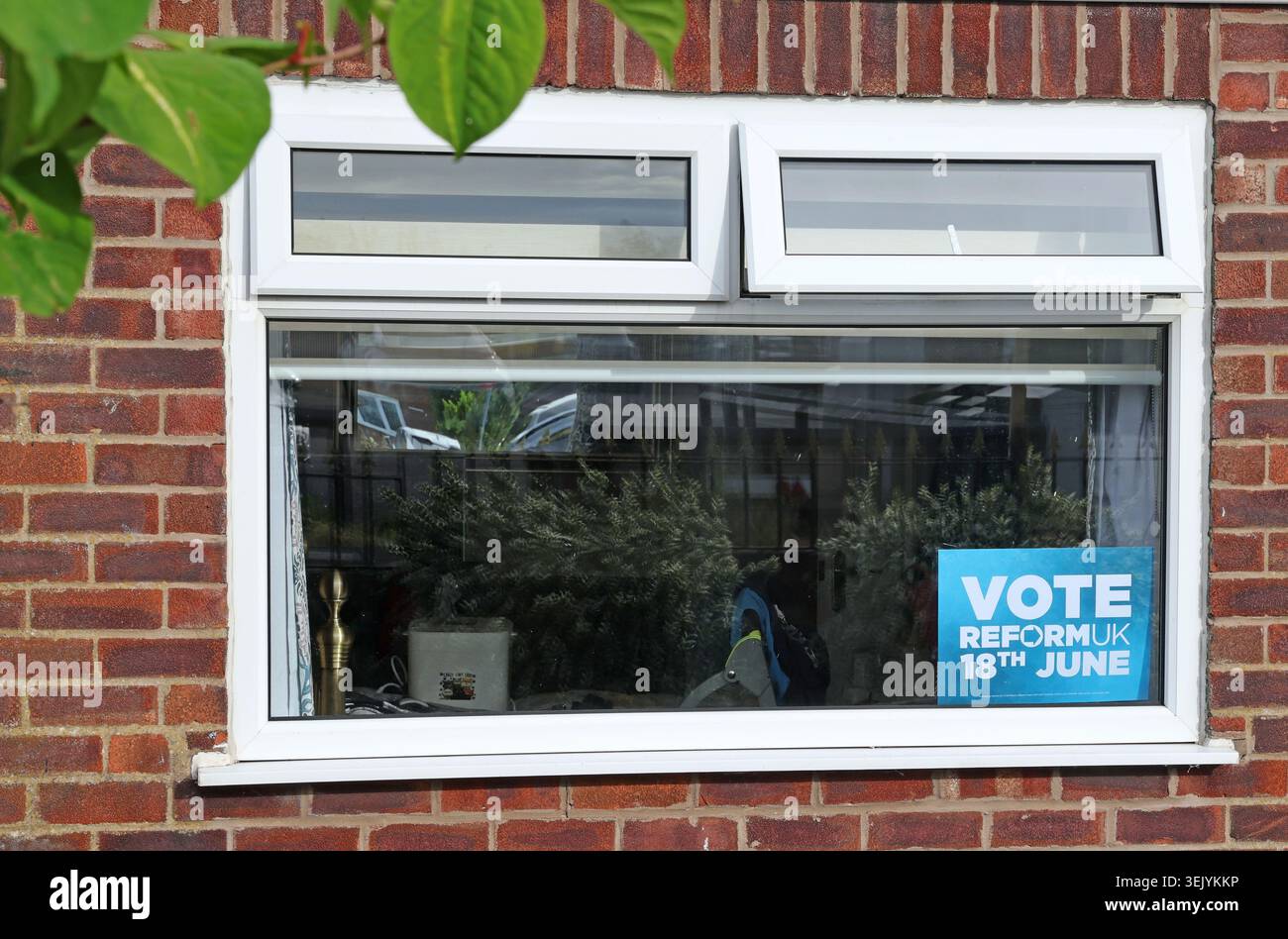 Reform UK window poster urges support in Ashton-in-Makerfield as Robert Kenyon challenges Andy Burnham for Makerfield.18 June 2026 Stock Photo