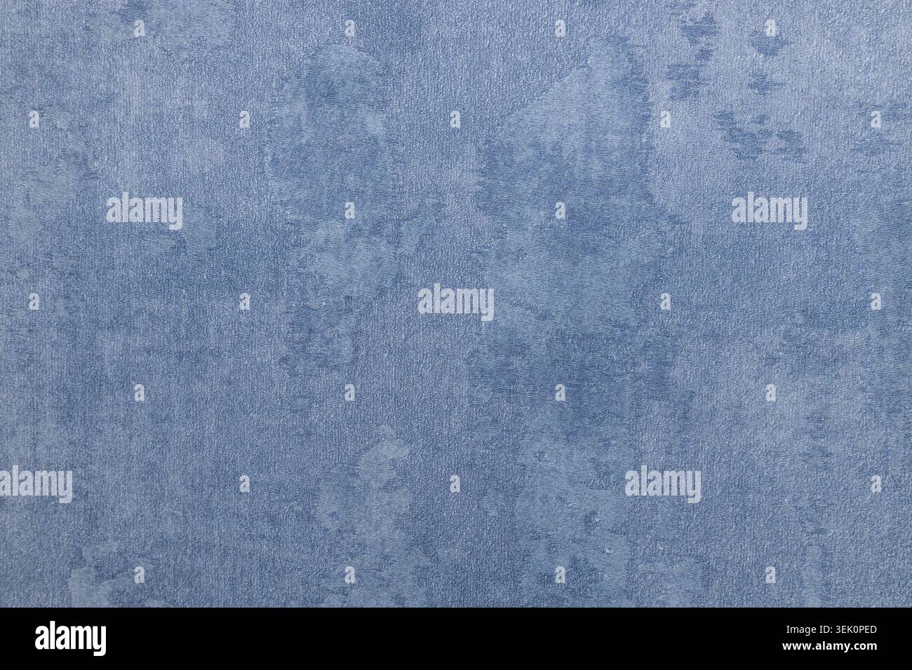 Blue mottled fabric texture background with subtle textile detail Stock Photo