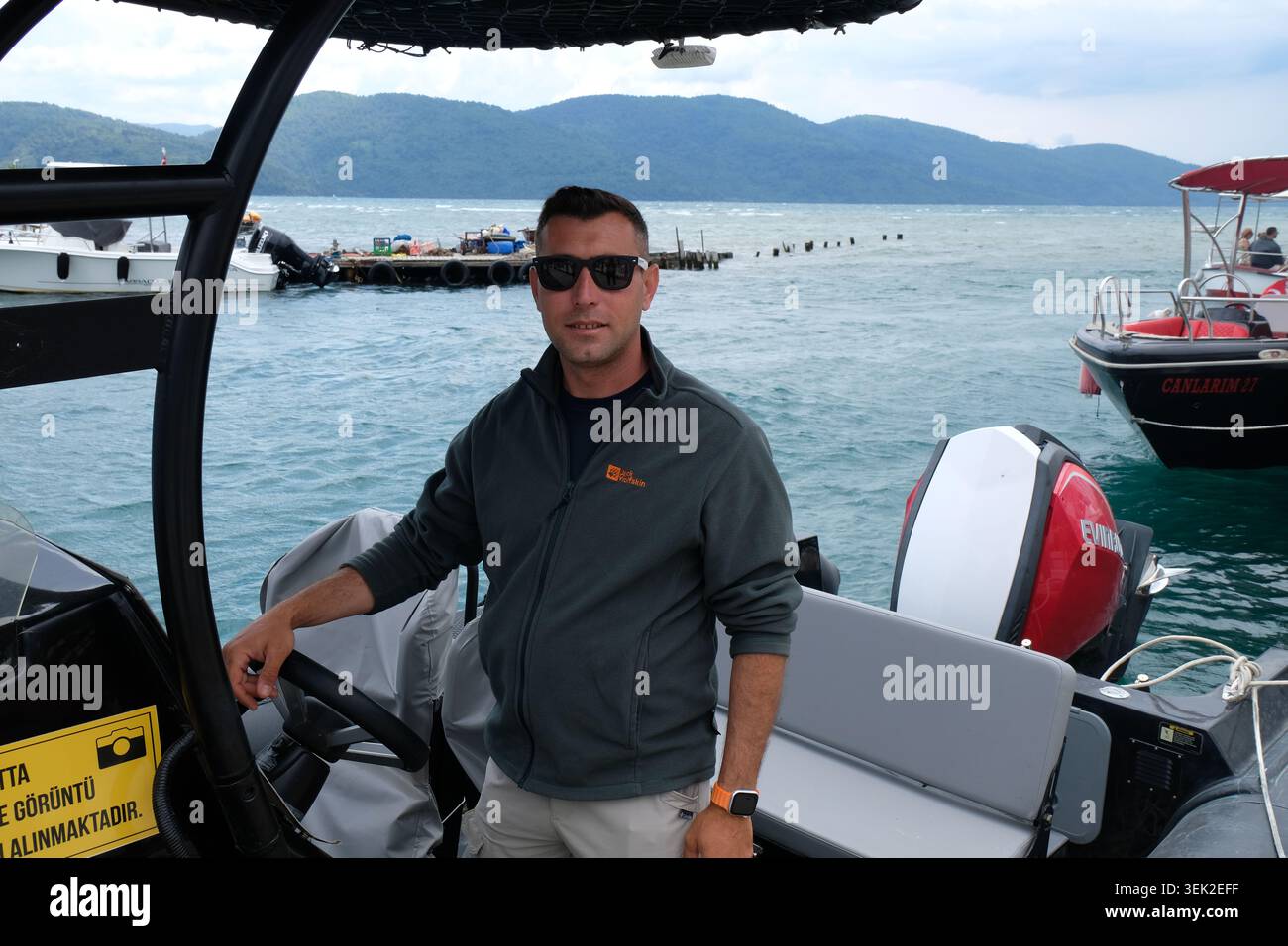 31 May 2026, Turkey, Akyaka: Ranger Murat Bagci on a patrol boat of the ...