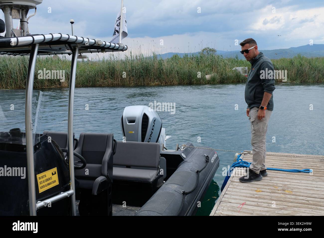 Turkey Ranger 31 May 2026, Turkey, Akyaka: Ranger Murat Bagci on a patrol boat of the ...