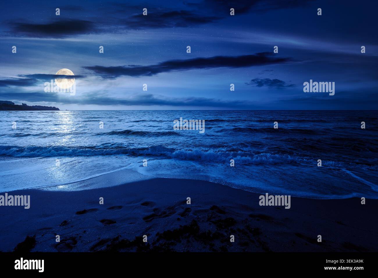 black sea landscape in summer at night. full moon over bulgaria nature landscape with sandy beach. mysterious summer vacation at the sea shore concept Stock Photo
