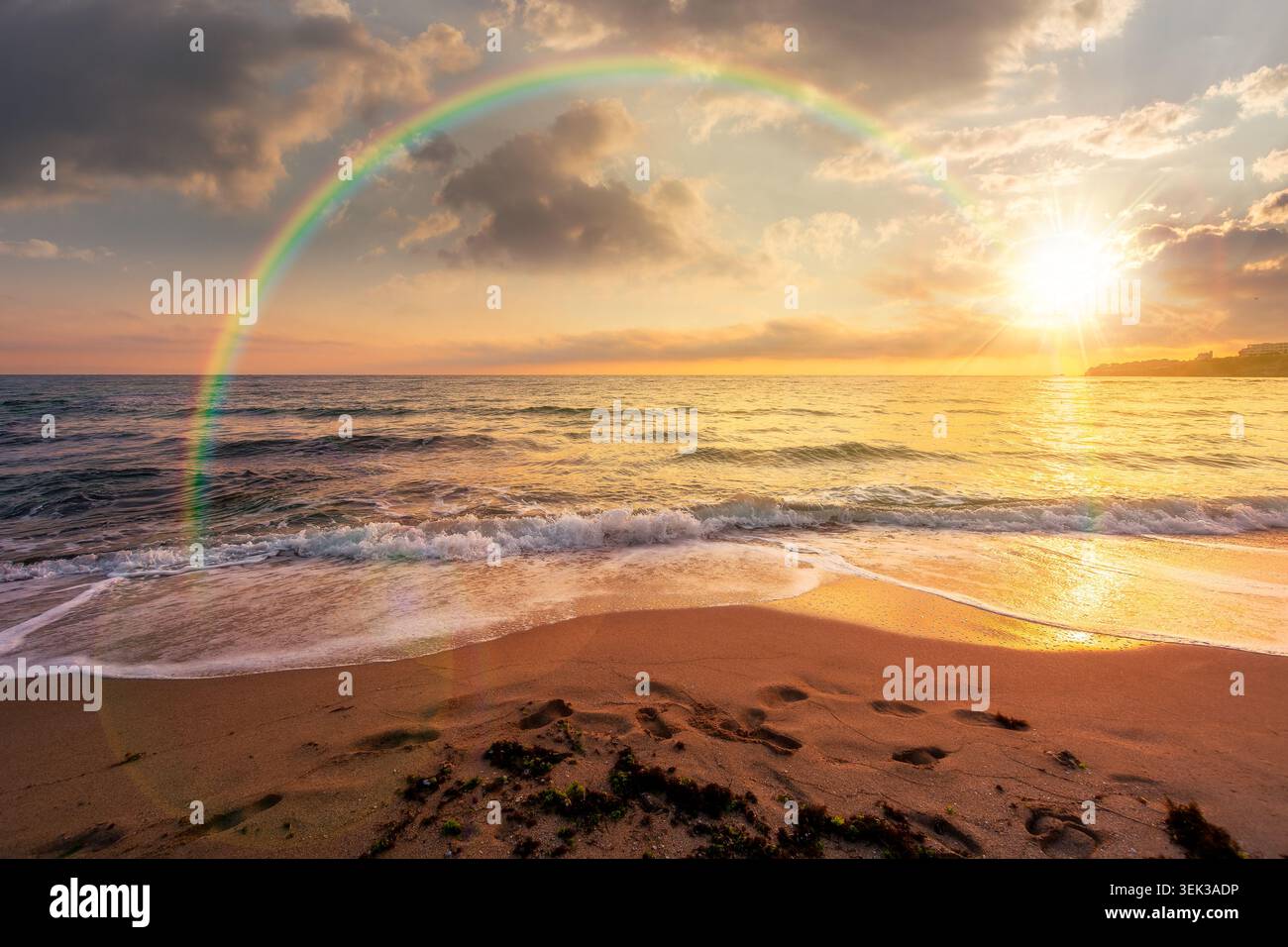 sunset over black sea landscape in summer. bulgaria nature landscape with sandy beach. summer vacation at the sea shore concept. waves and empty beach Stock Photo