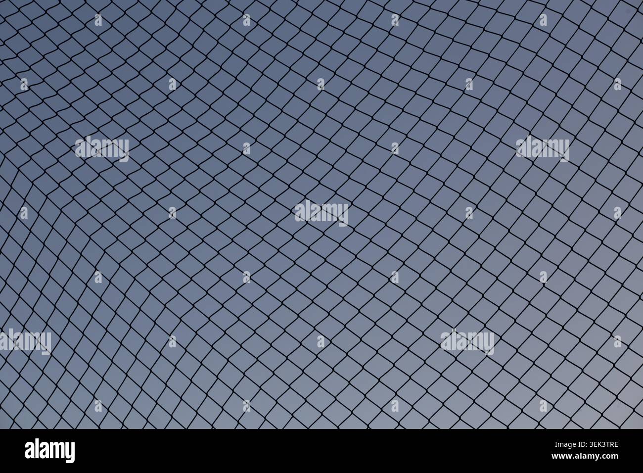 Abstract safety net pattern against blue sky background Stock Photo