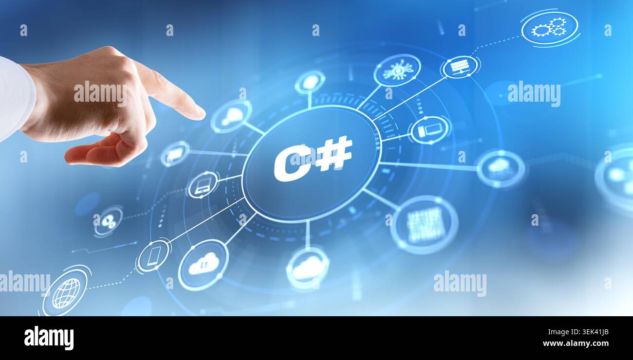 Software developer interacts with C# programming icon on modern IDE interface for application development. Stock Photo