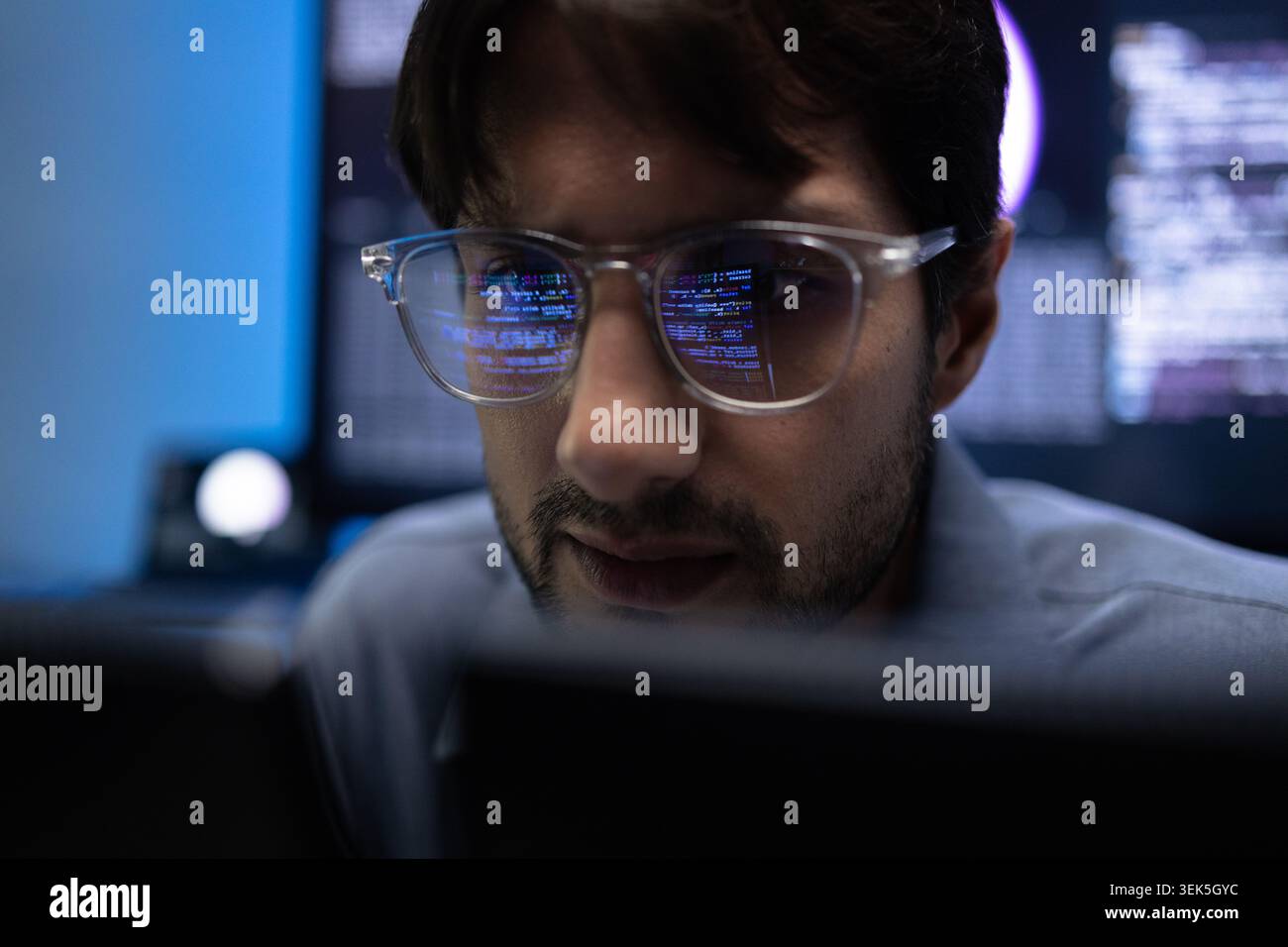 Young Latin Programmer Glasses With Code Reflection On Lens Stock Photo