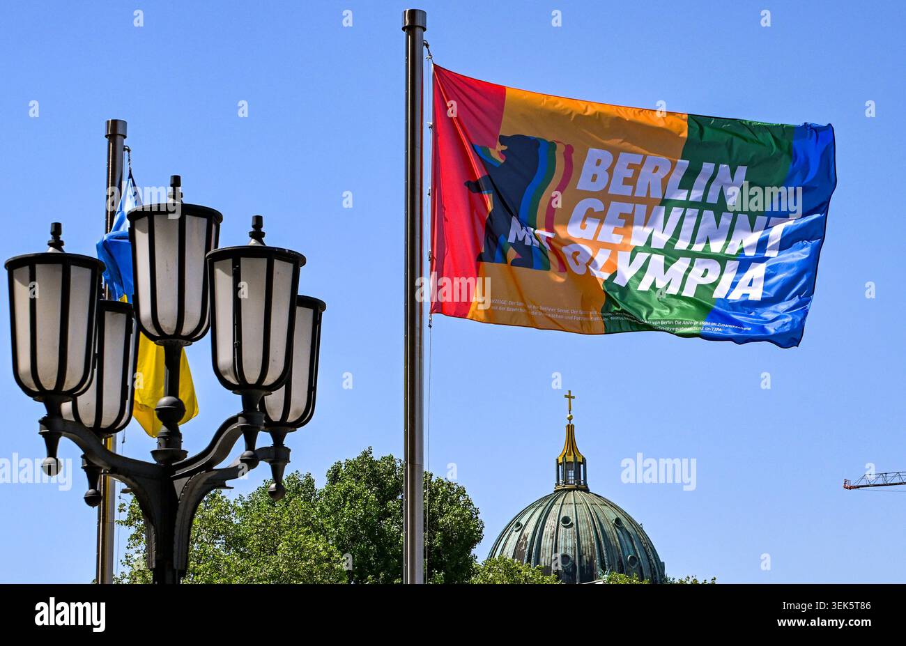 26 May 2026, Berlin: The Olympic flag flies at the Red City Hall, with ...
