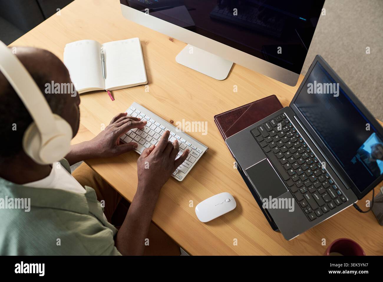 Black Senior Man Learning Online at Home Using Computer Stock Photo