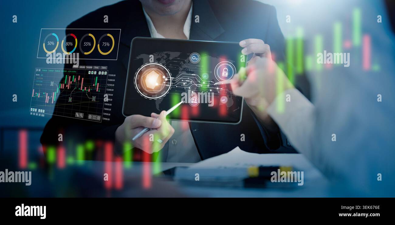 Business professionals analyzing AI data on digital tablet for financial technology Stock Photo