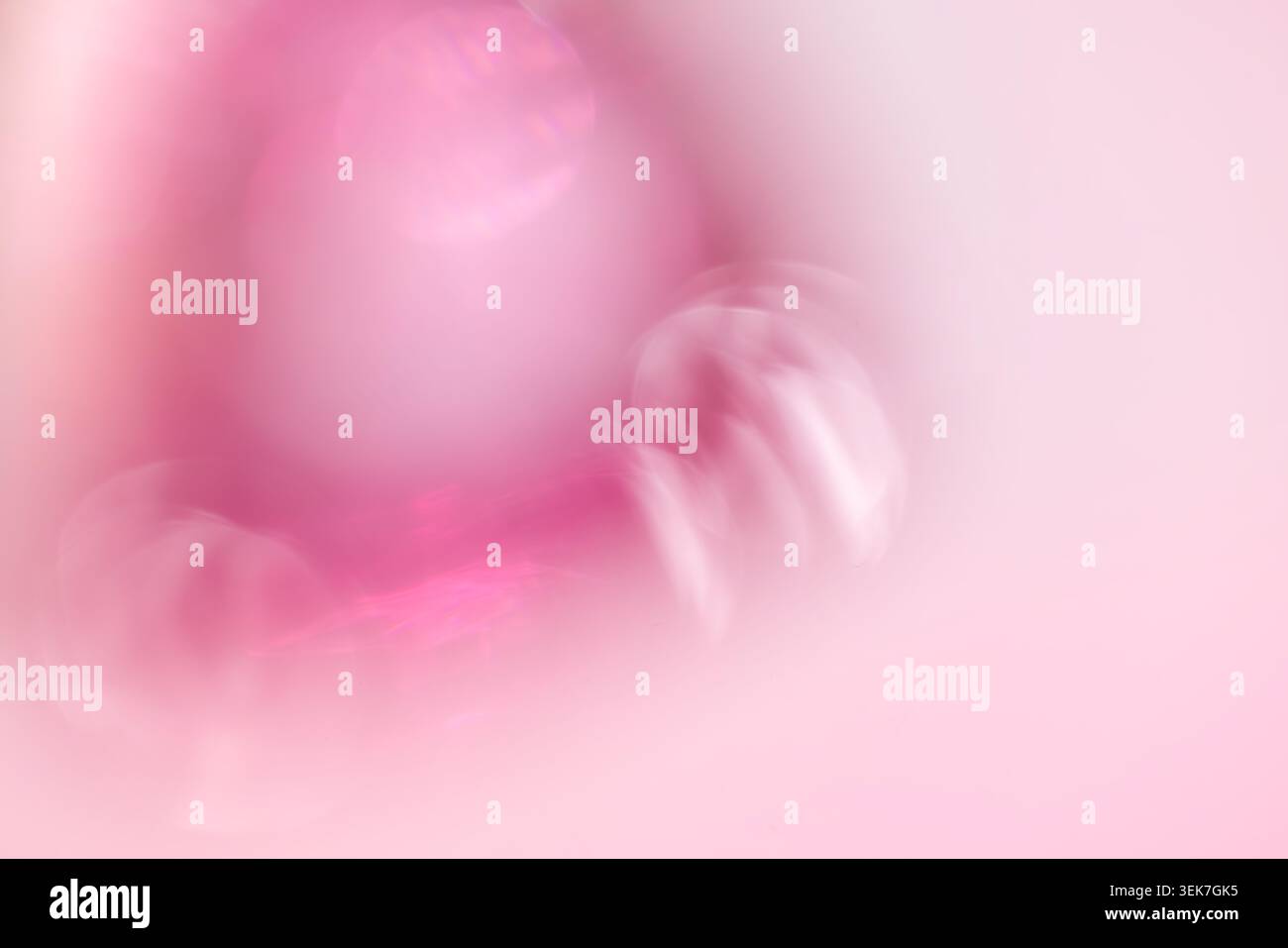 Abstract Pink Background with Blurred Shapes and Soft Light Patterns Stock Photo