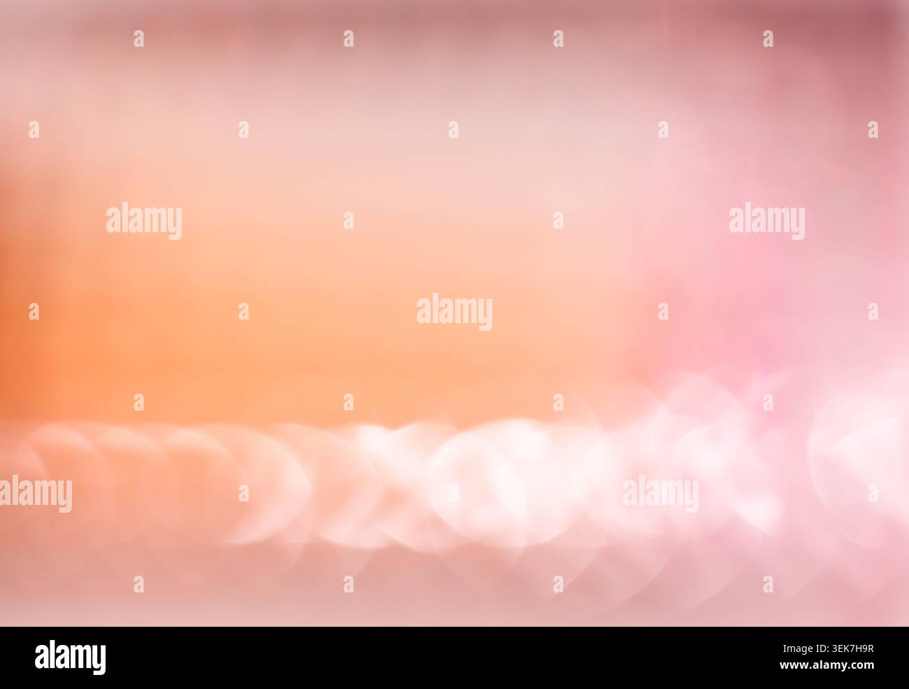 Abstract Blurred Gradient Background with Soft Orange and Pink Hues Stock Photo