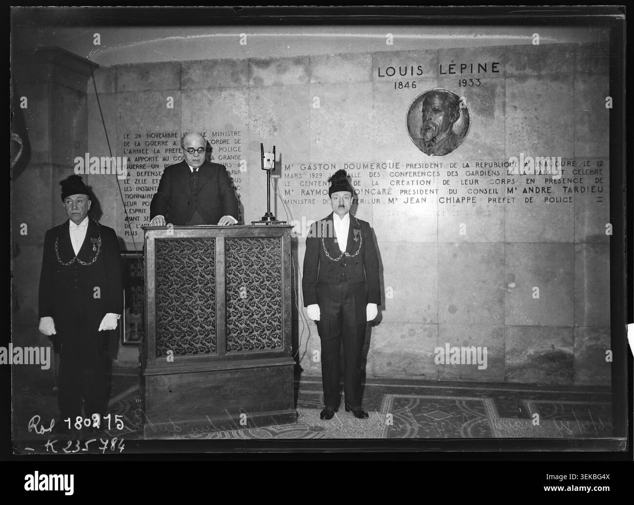 Albert Sarraut attends the inauguration of a bust of Louis Lépine at the Paris police headquarters on Île de la Cité, where officials gather for a civic ceremony; the press photograph records the dedication of the sculpture in interwar France. Stock Photo