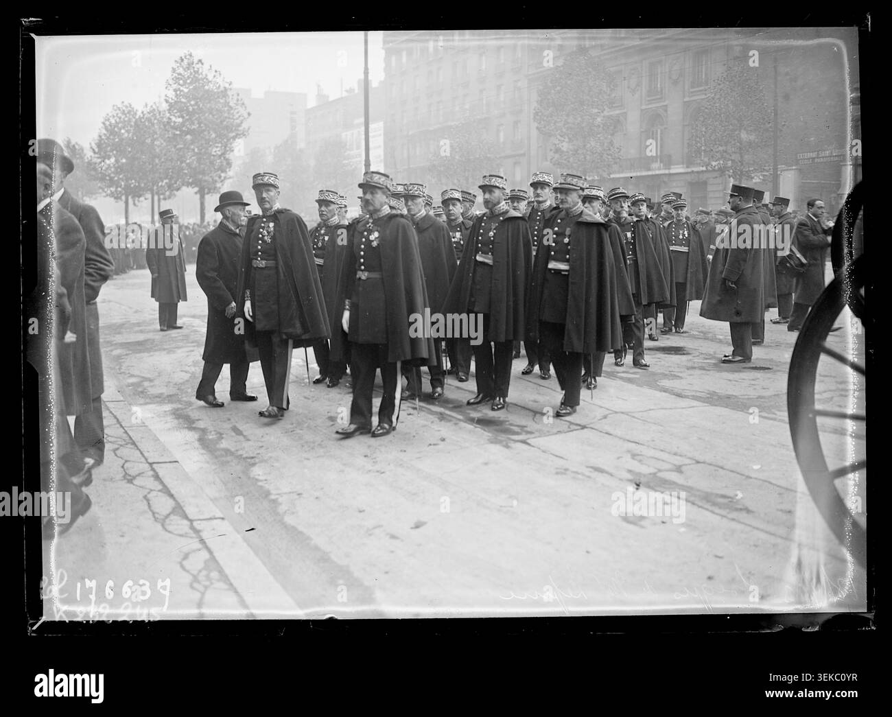A delegation of police chiefs gathers for the funeral of Louis Lépine in front of Notre-Dame-des-Champs on Boulevard du Montparnasse in Paris on 13 November 1933. The press photograph records participants attending the funeral ceremony. Stock Photo
