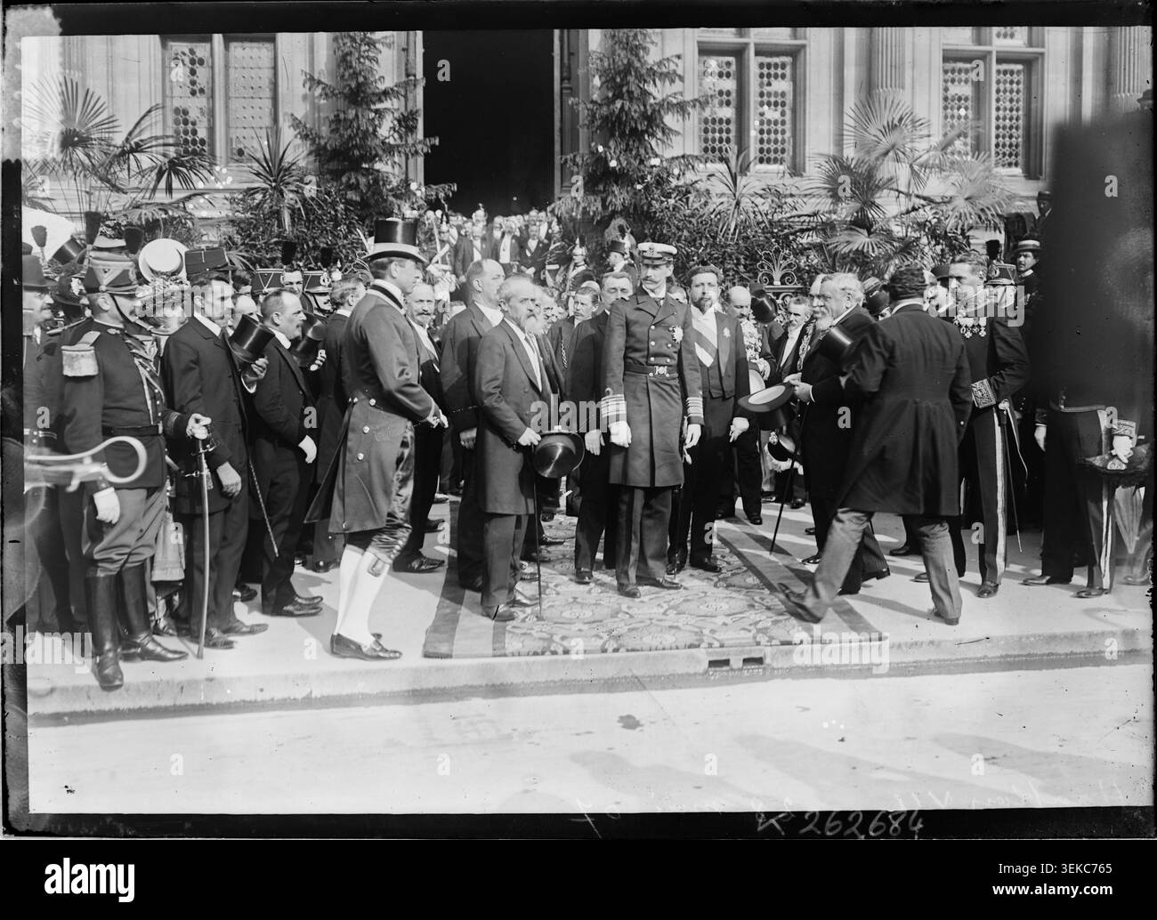 Haakon VII, Louis Lépine, André Lefèvre, and Armand Fallières stand before Paris City Hall on May 28, 1907, during an official visit. The press photograph records the group assembled in Paris for a civic reception involving political and municipal leaders. Stock Photo