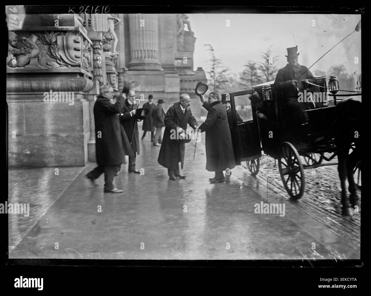 Louis Lépine receives Commerce Minister Georges Trouillot at the Grand Palais on February 17, 1906, for the inauguration of the Paris Fair. The press photograph records the officials attending the opening ceremony of the commercial event in Paris. Stock Photo