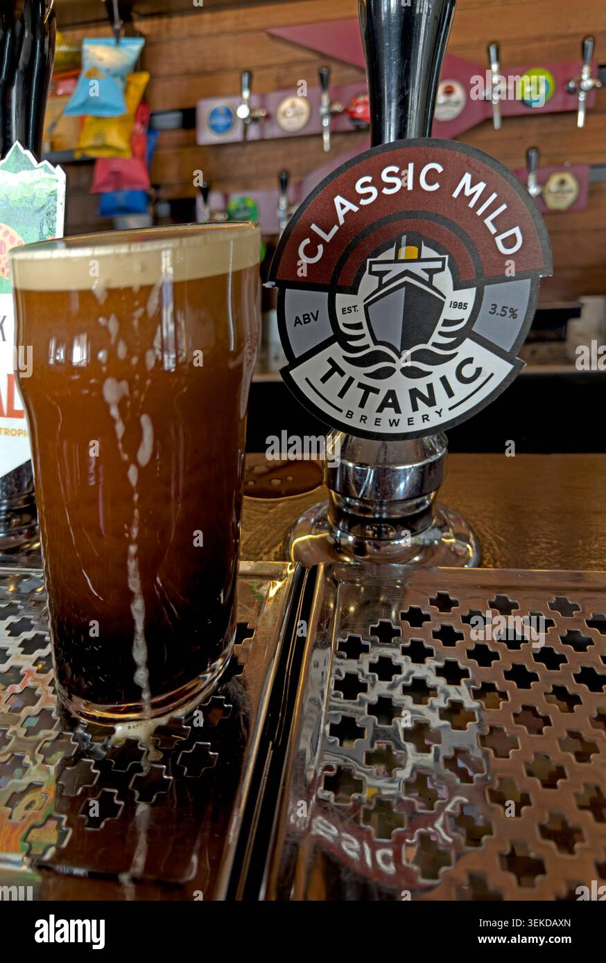 Titanic Classic Mild full pint of dark beer in a British pub, UK. Stock Photo