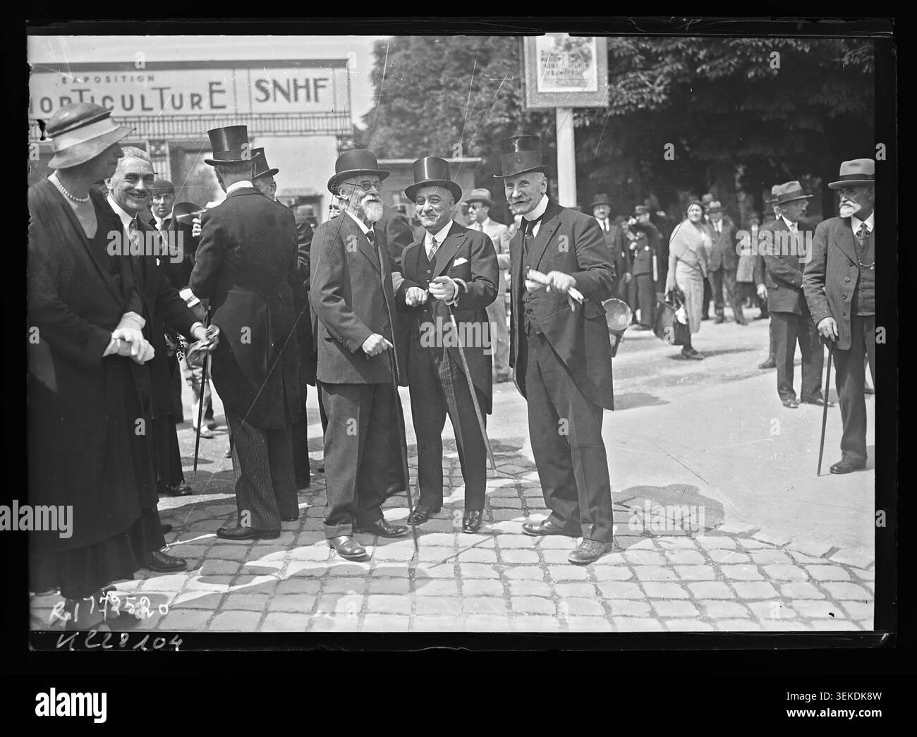 Louis Lépine, Jean Chiappe and Maurice Le Corbeiller attend a horticultural exhibition at Cours-la-Reine in Paris on 22 May 1933. The press photograph records a collective portrait connected with the exhibition in the 8th arrondissement. Stock Photo