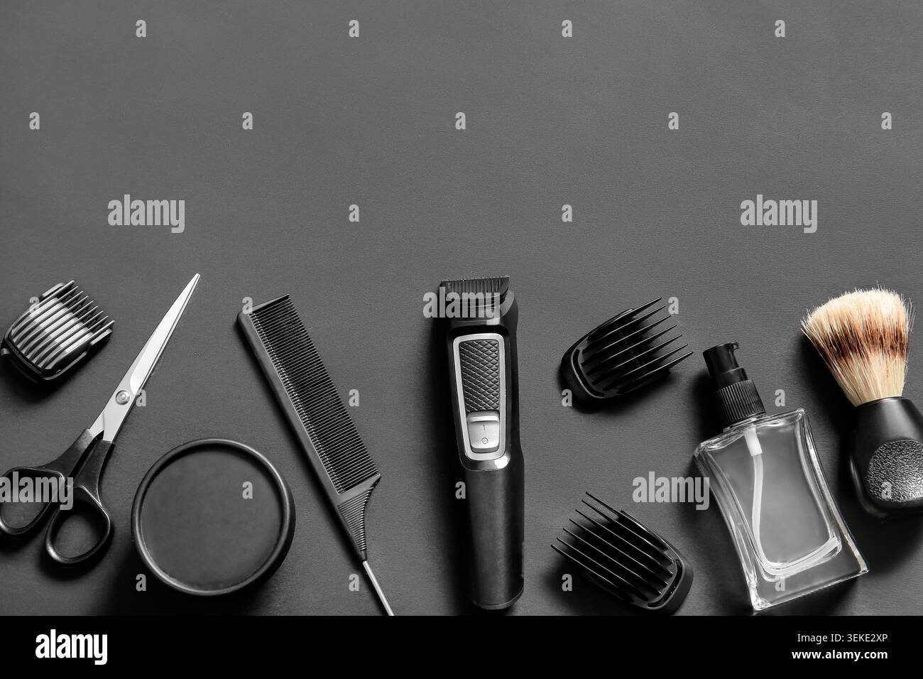 Modern trimmer and shaving accessories on black background Stock Photo