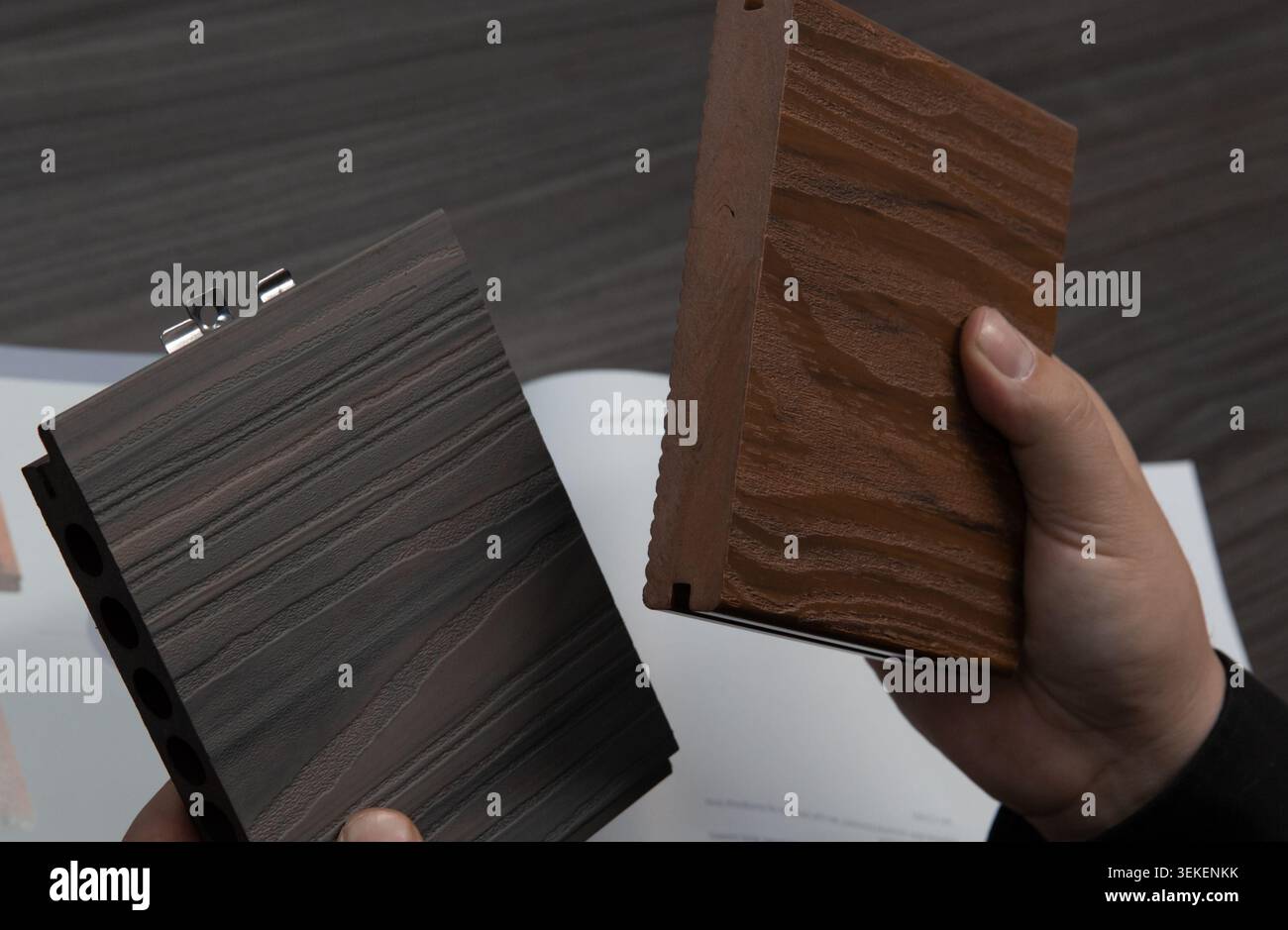 shopping for flooring tiles from samples on a table Stock Photo