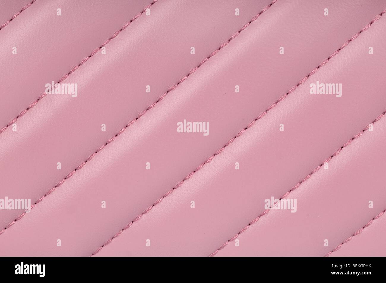 Pink quilted leather texture background surface Stock Photo