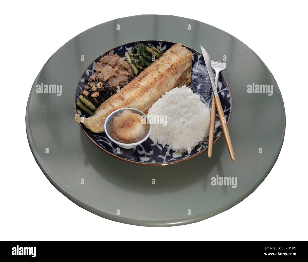 a Japanese set meal presented circular tabletop isolated on a white background with clipping path, a deep-blue patterned ceramic plate is a beautifull Stock Photo