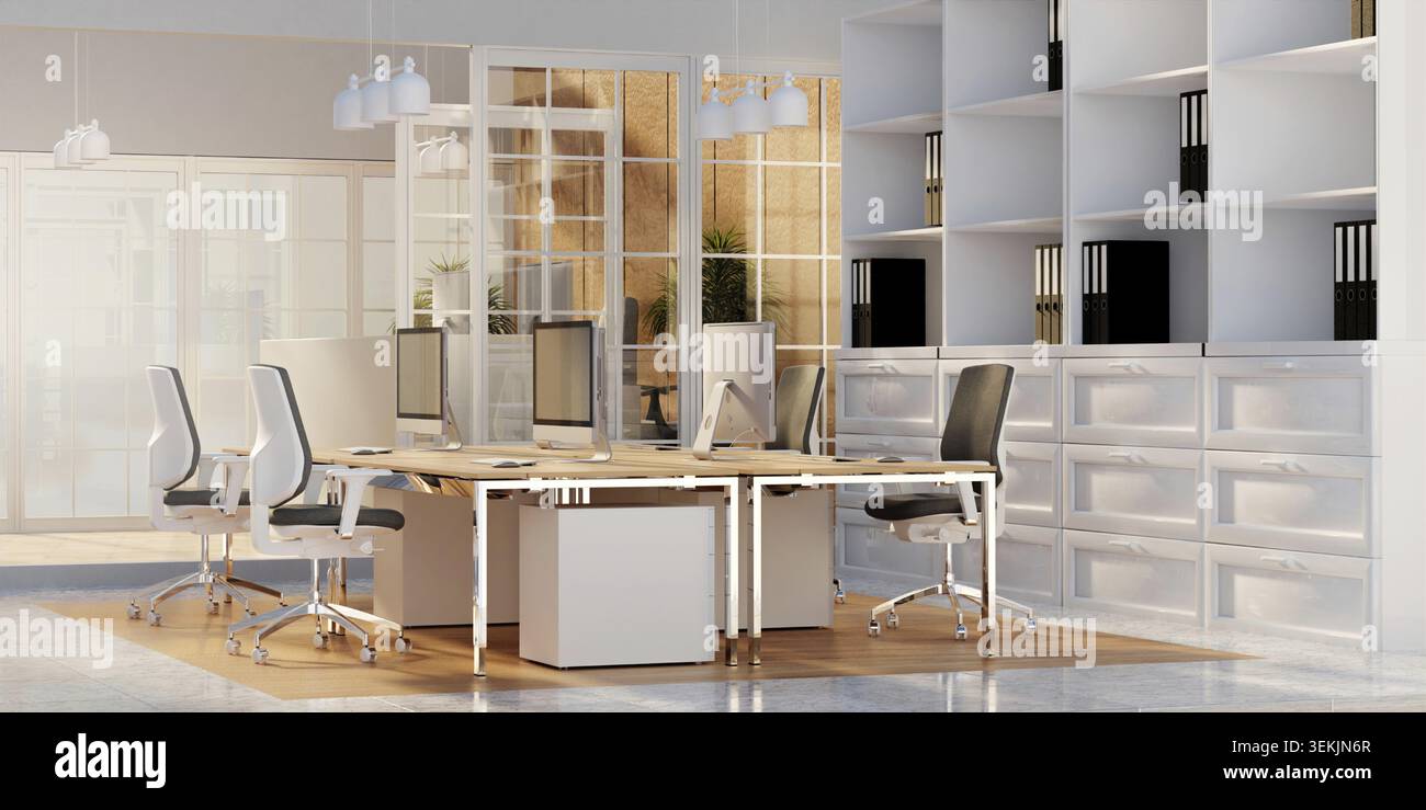 A sleek modern office workspace featuring a collaborative layout with computer desks, ideal for productivity and creativity Stock Photo