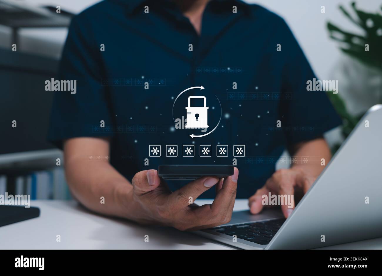Password Reset Security and Forgotten Password Recovery Concept. User using smartphone and laptop with padlock, hidden passcode, and refresh arrows Stock Photo