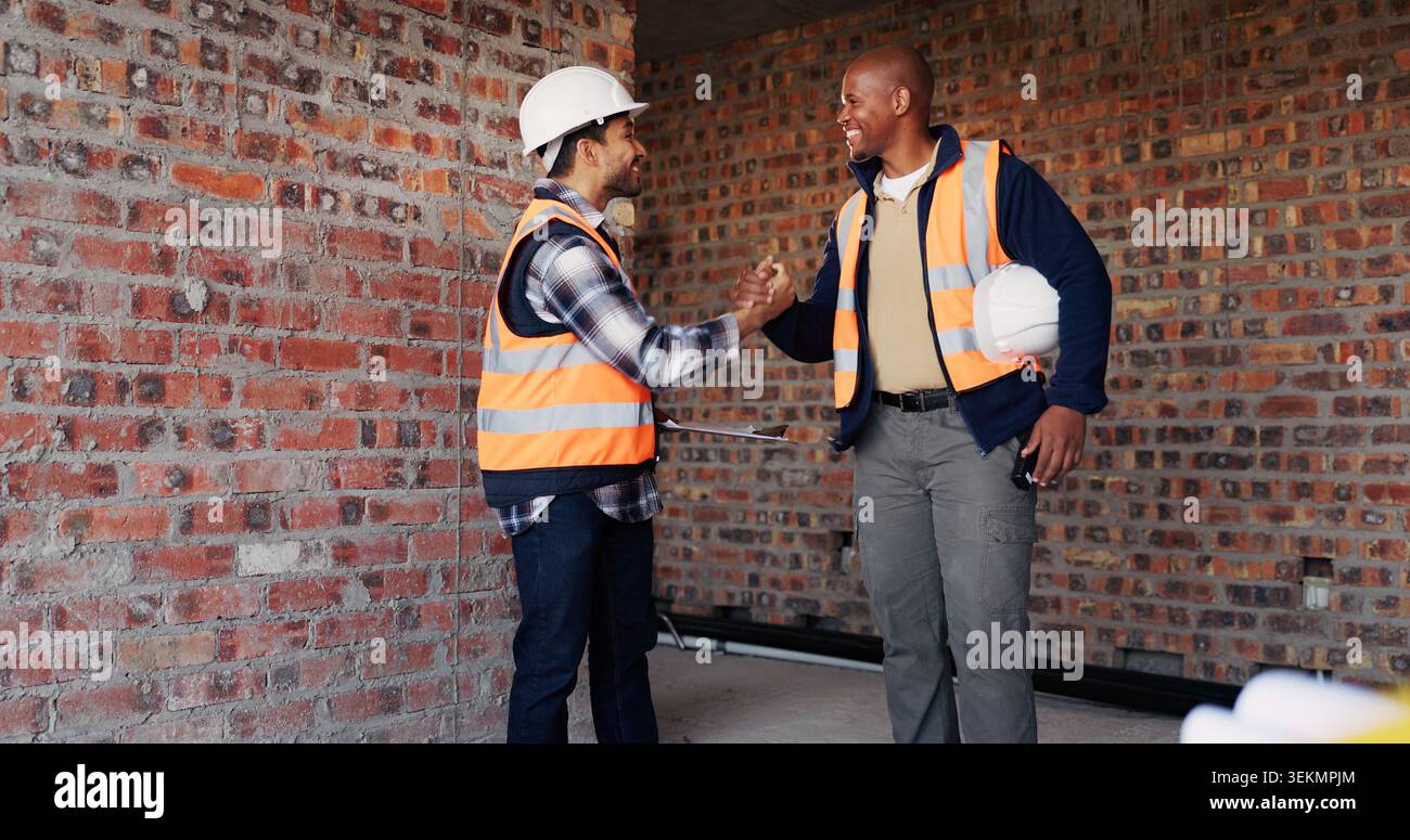 Handshake, men and civil engineers on site with deal, agreement or collaboration for building. Teamwork, industry and male construction workers Stock Photo