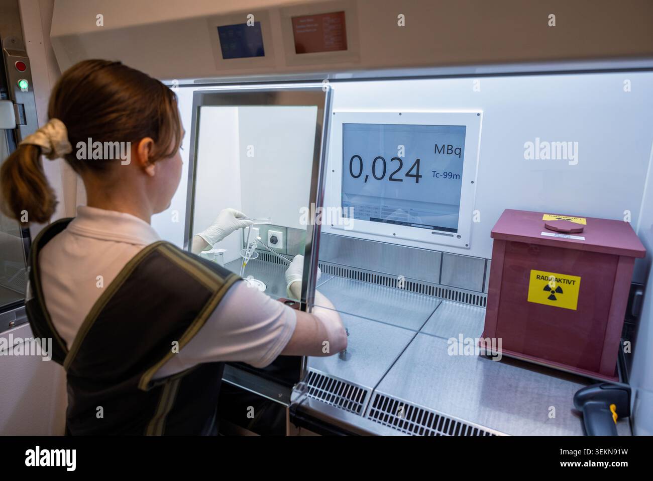 Female lab technician working with blood samples in laboratory Stock Photo