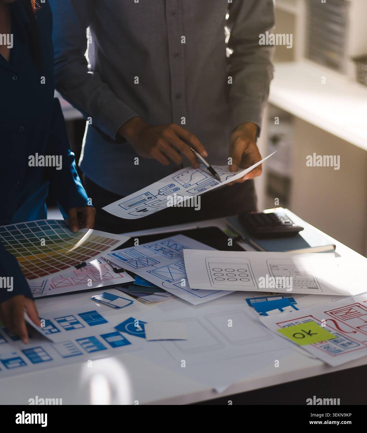 Team of Program Developer Collaborating on UXUI Design Planning in a Modern Office Environment Stock Photo