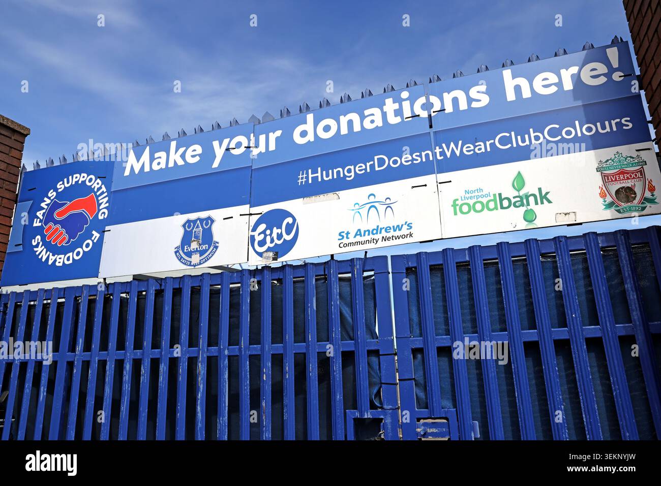 Everton EFC foodbank support banner outside Goodison Park in Liverpool, England, UK. Stock Photo