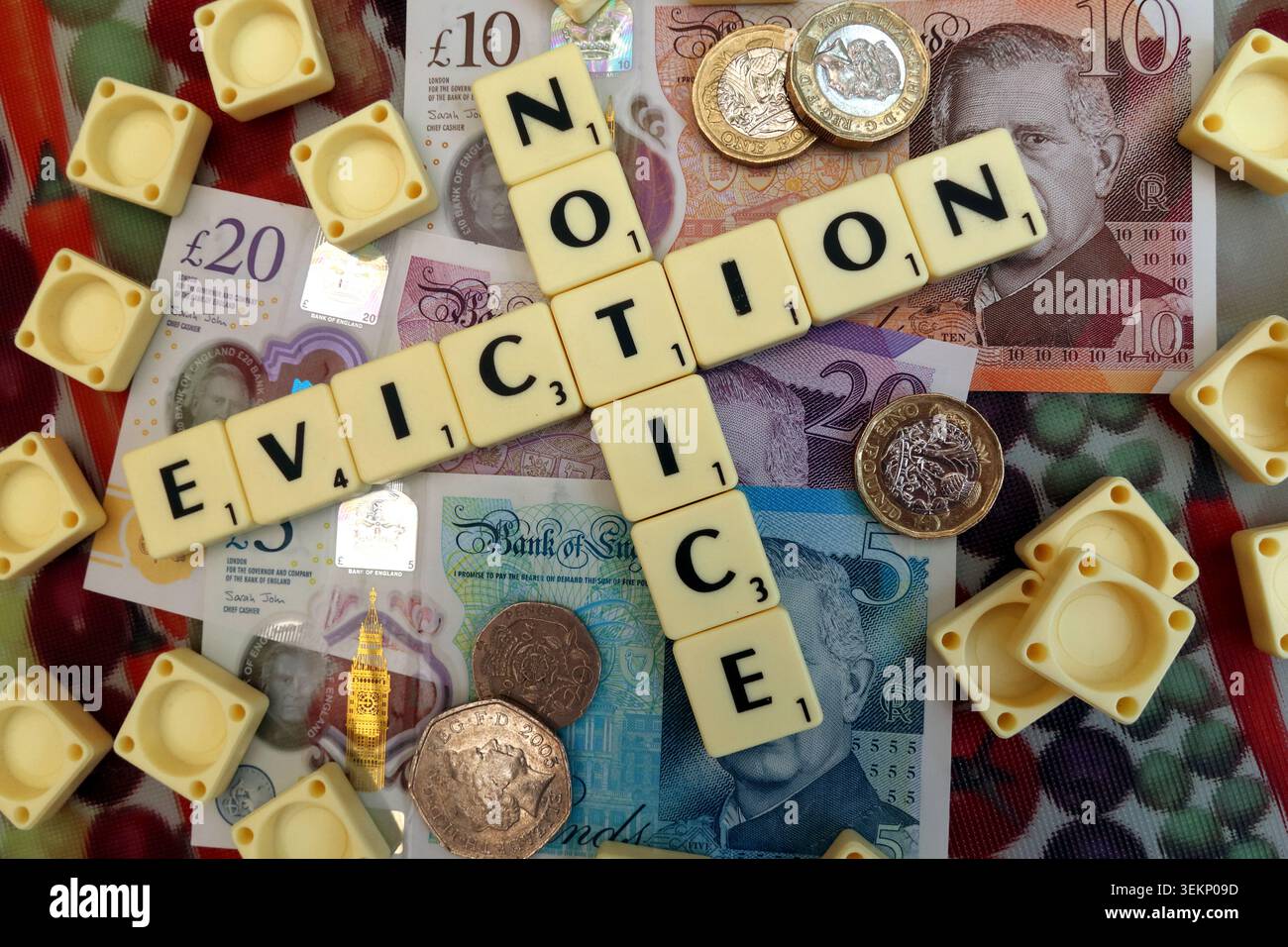 Concept image of Eviction Notice in Scrabble letters on King Charles banknotes and coins, about PRS and social housing evictions. Stock Photo