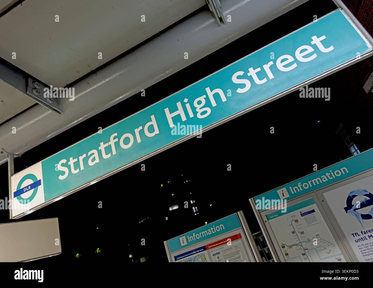 Stratford High Street DLR station sign at night, illustrating integrated public transport and evening travel in east London Stock Photo