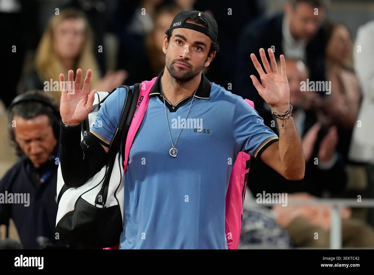 italy-s-matteo-berrettini-walks-off-the-becouse-of-an-injury-during-the