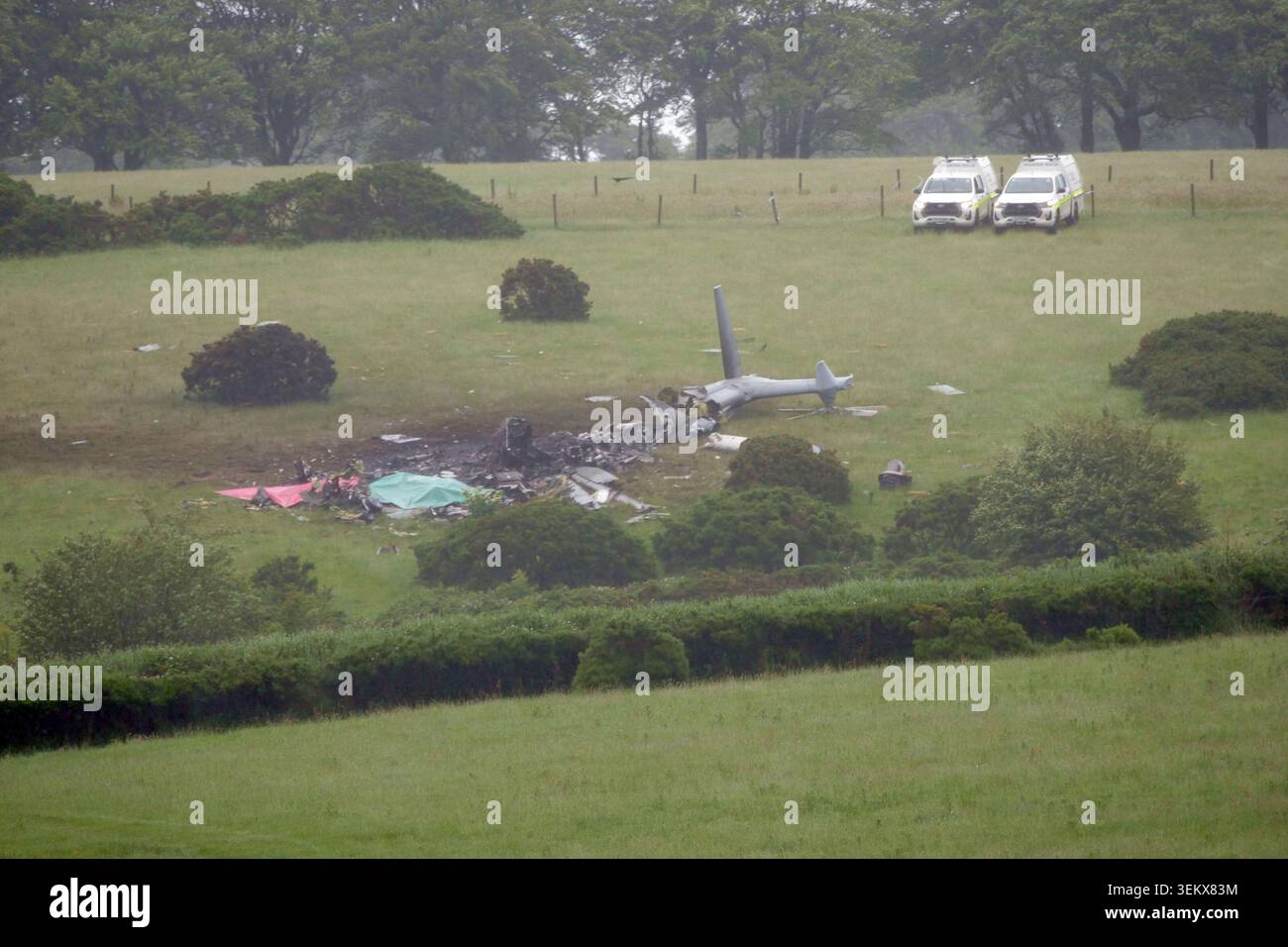 The scene in Sourton Down, near Okehampton in Devon, where a Royal Navy helicopter crashed in a field on Wednesday. Three members of the Royal Navy have died in the crash. Picture date: Thursday June 4, 2026. Stock Photo