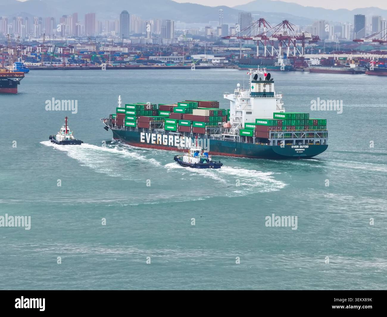 Large container ships loaded with foreign trade goods arrive at or ...