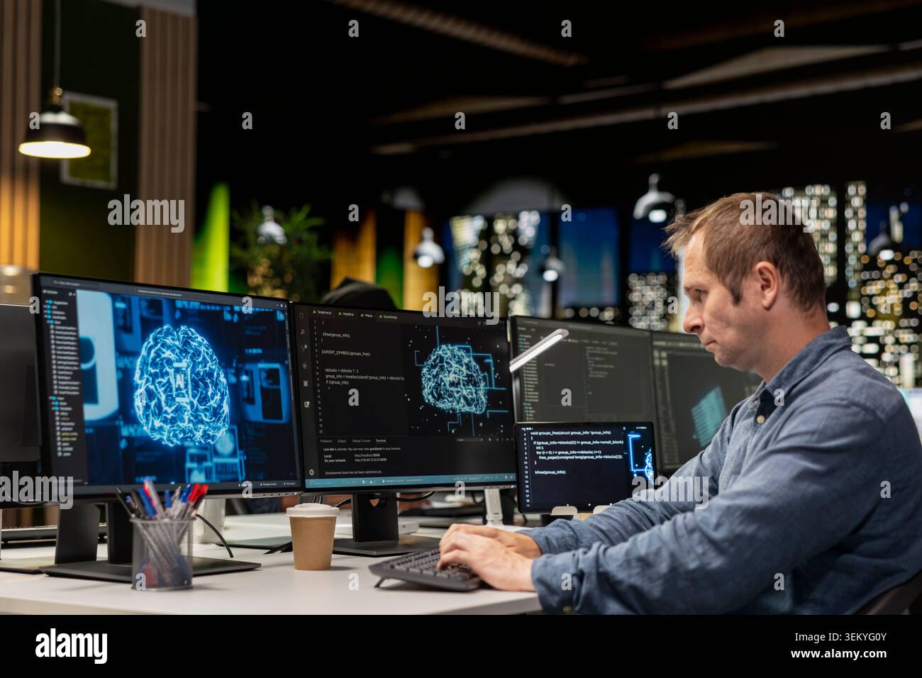 Software developer in office automating repetitive tasks using AI scripts on devices. IT professional using artificial intelligence app on computer to speed up feature implementation Stock Photo