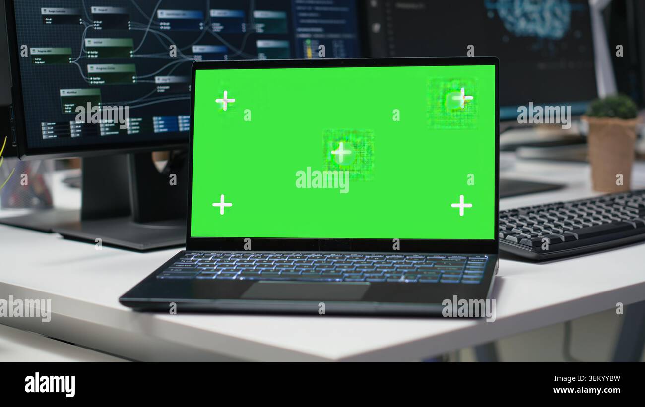 Isolated screen laptop in empty Silicon Valley company office used for developing apps. Mockup notebook using deep learning tech in workplace to debug applications and resolve issues Stock Photo