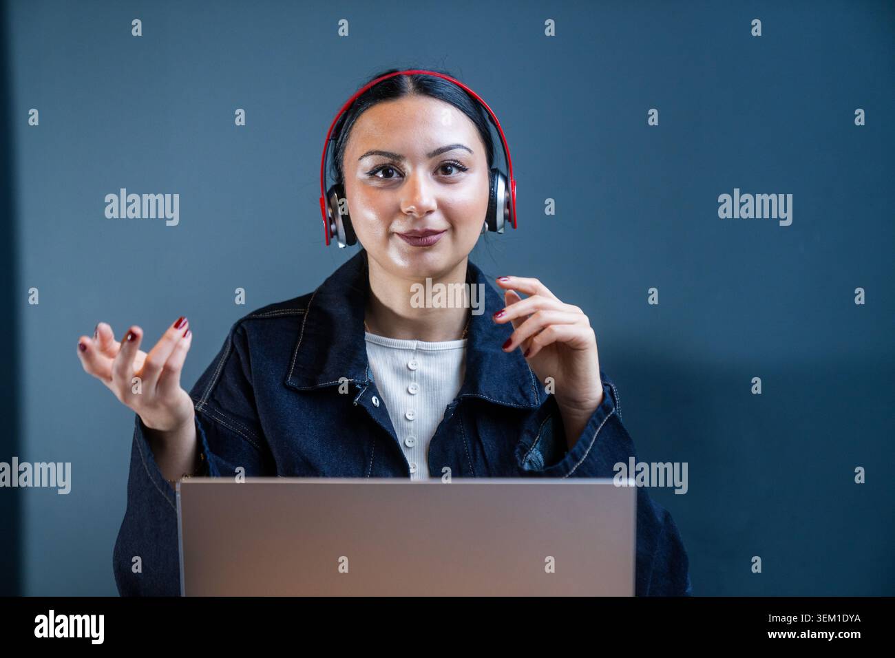 Professional customer support representative communicating through digital channels. Suitable for customer service, technical support, call centers, o Stock Photo