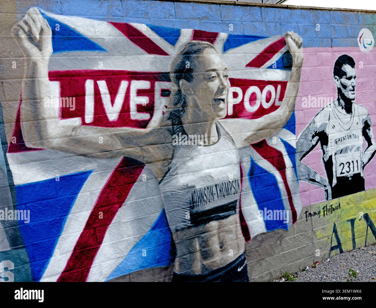 Liverpool-born heptathlete Katarina Johnson-Thompson and Paralympic sprinter Jonnie Peacock feature in a sports mural near Liverpool Arena Stock Photo