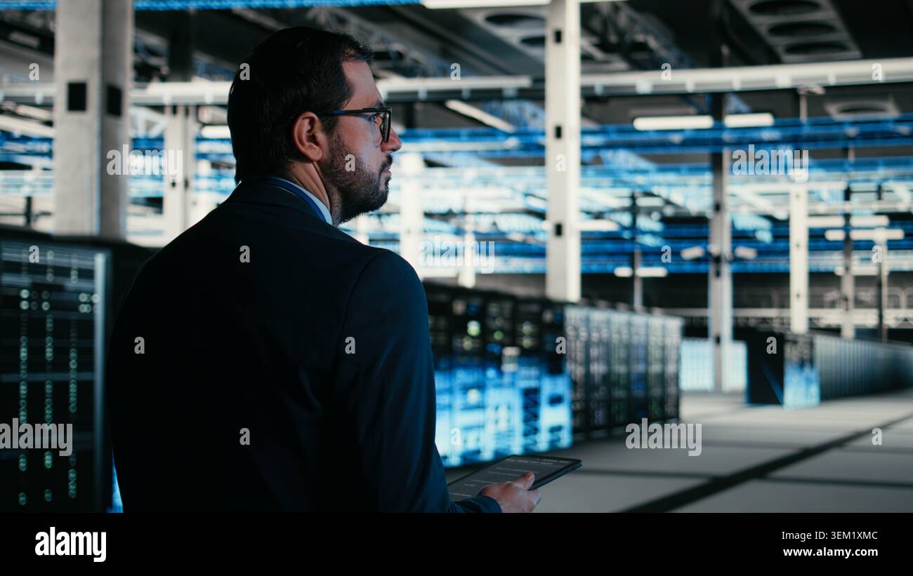 Writing code, tablet closeup and engineer in data center compiling software patches to fix bugs. Running programming script, device application and IT professional in server farm, camera A Stock Photo
