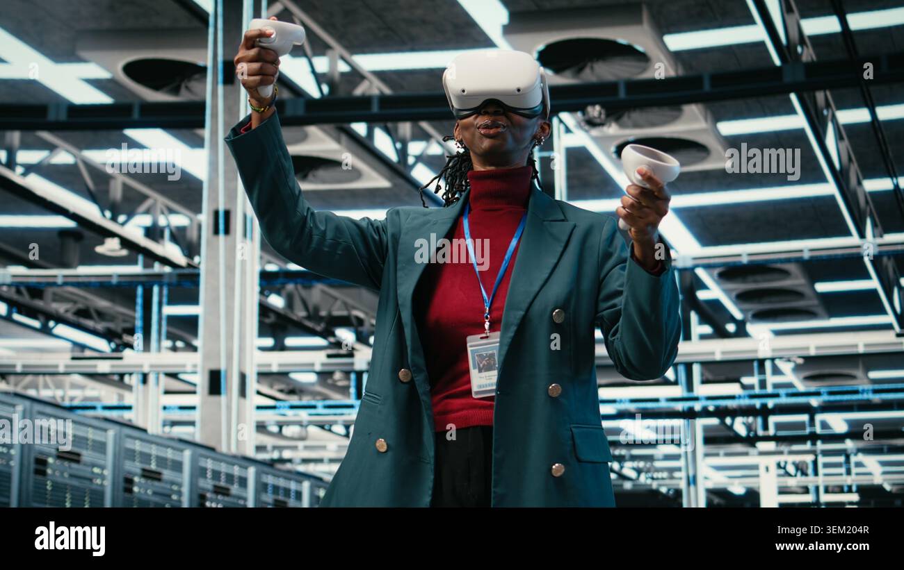 VR headset gear, AR simulation and system administrator in data center managing database storage rigs. Cloud computing, VFX visualization and worker in server room using virtual reality tech, camera A Stock Photo