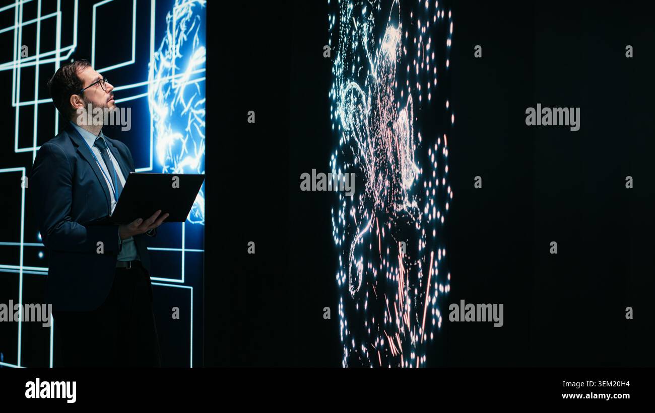 Programmer reconfiguring AI node connections using augmented reality simulation. Computer scientist uses AR visualization to control artificial intelligence brain neurons with hand gestures, camera B Stock Photo