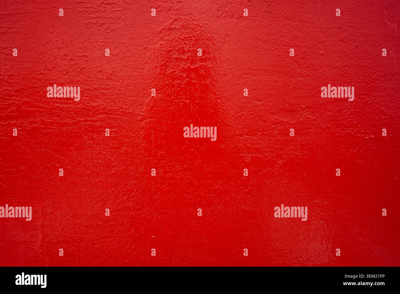 Rough metallic surface painted red. Stock Photo