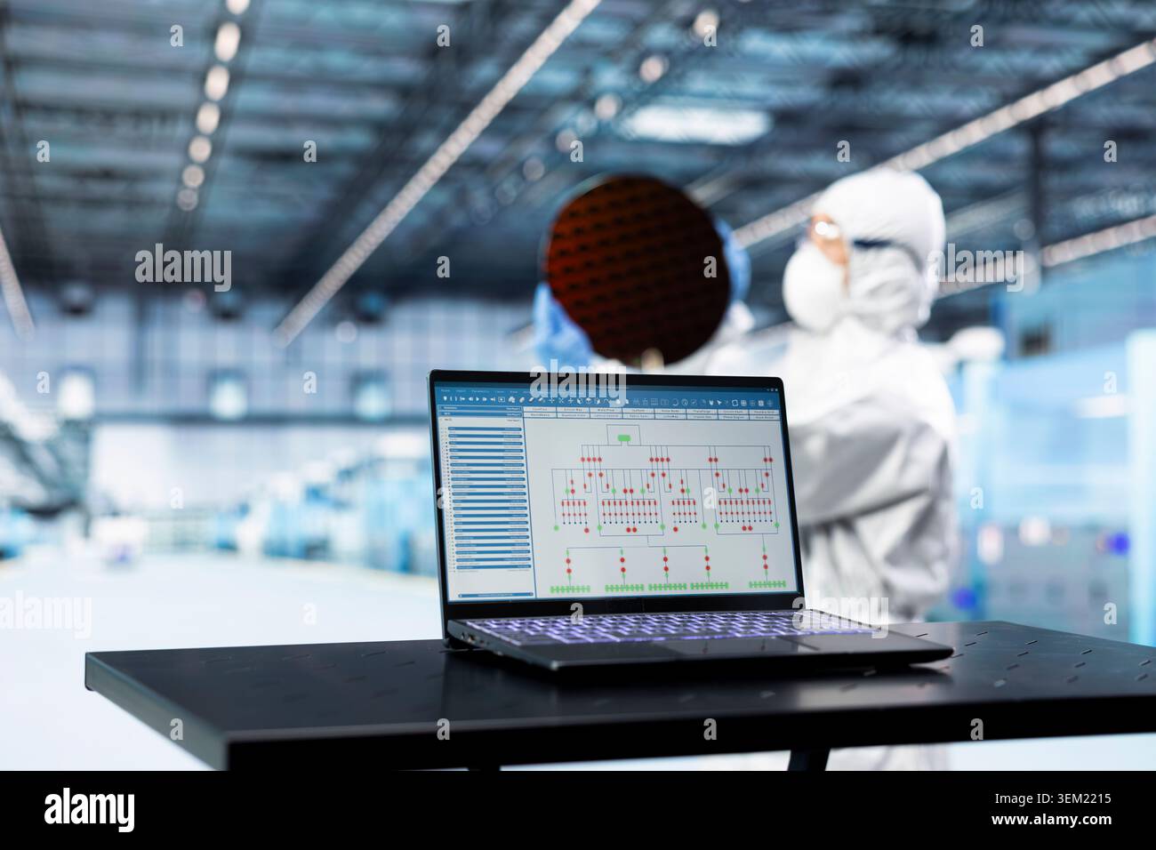 Close up of EDA software on laptop in microchip industrial plant used by engineer. SoC architecture design program on notebook used by tech expert in semiconductor factory to automate systems Stock Photo