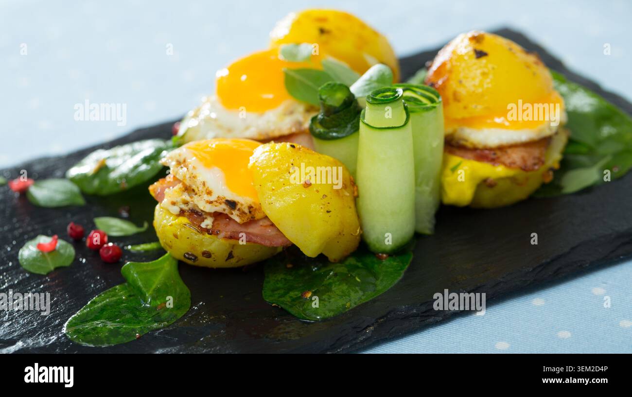 Potato burgers with quail egg Stock Photo