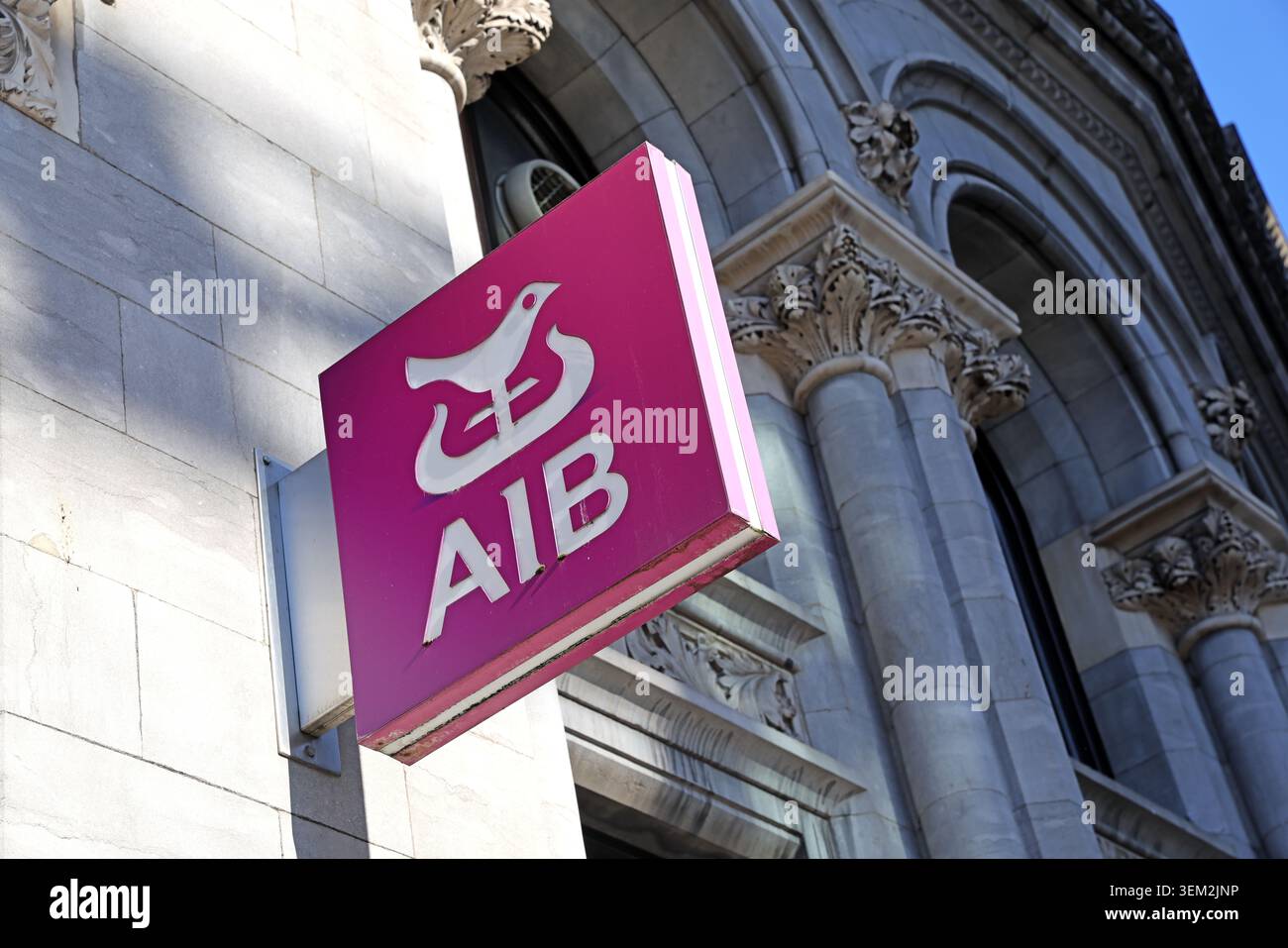 AIB sign on the historic Dame Street bank branch in Dublin, Ireland, with ornate carved stonework and arched windows Stock Photo