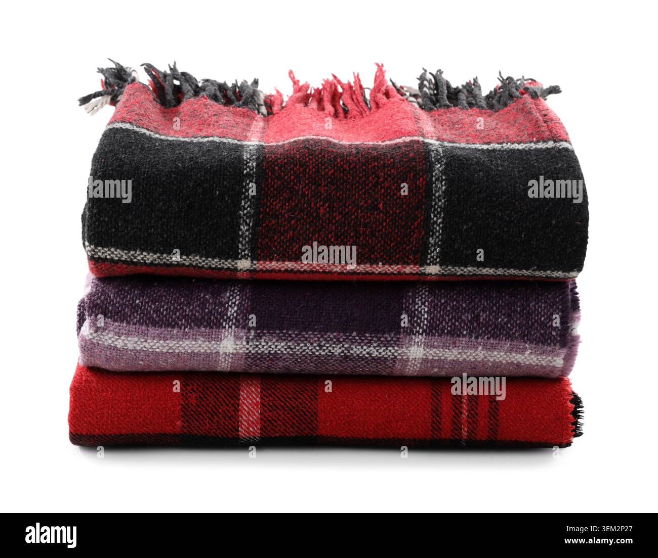 Stack of cozy blankets isolated on white background Stock Photo