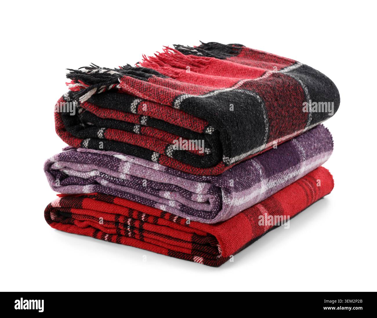Stack of cozy blankets isolated on white background Stock Photo