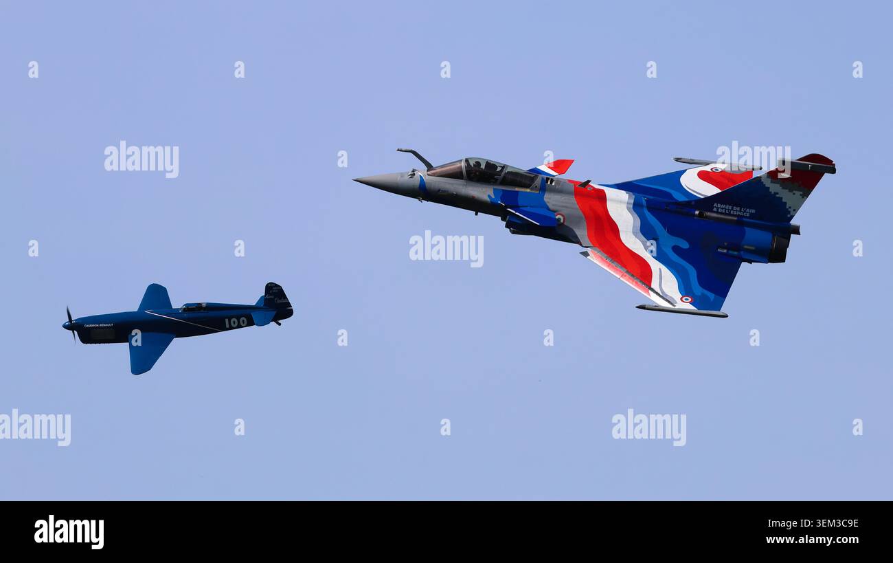 Tri Color Jet View of a Dassault Rafale fighter jet with tricolor livery flying in ...