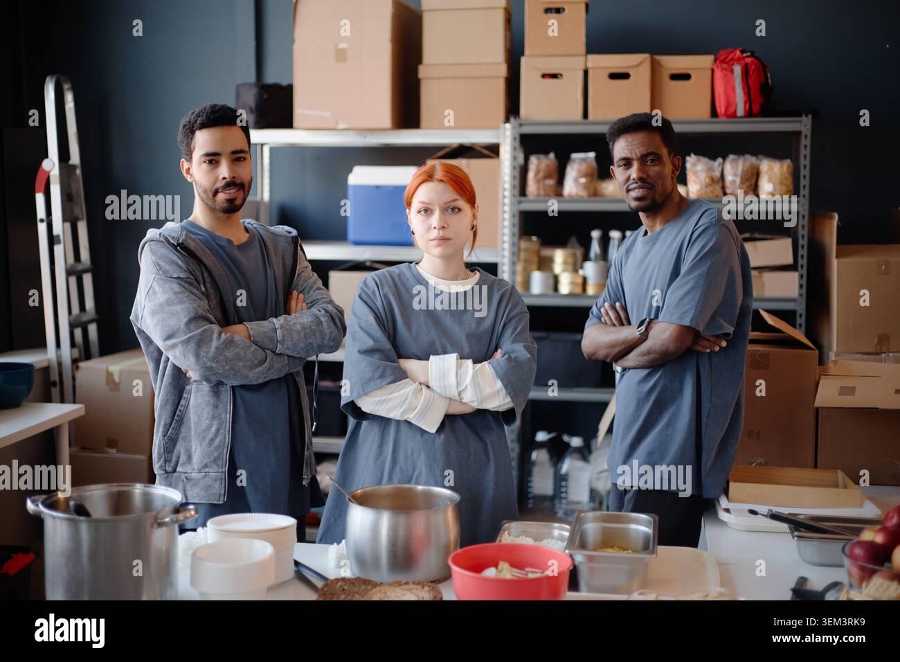Portrait of Diverse Volunteers Working in Humanitarian Aid Center Stock Photo